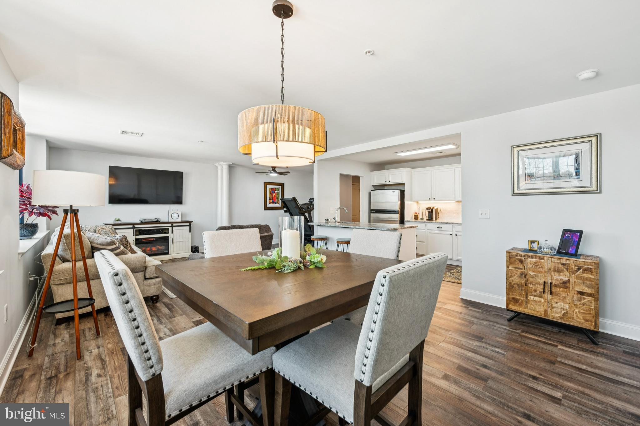 100 Aura Road, Unit 410 Clayton, NJ 08312 - Photo 11 of 25 Modern open-concept living space awaits you.