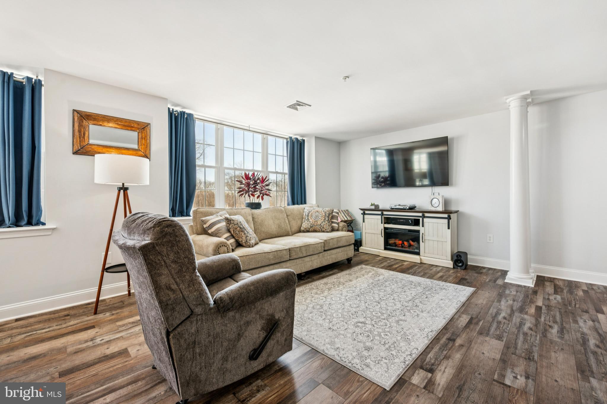 100 Aura Road, Unit 410 Clayton, NJ 08312 - Photo 13 of 25 Bright and inviting living space with charm.