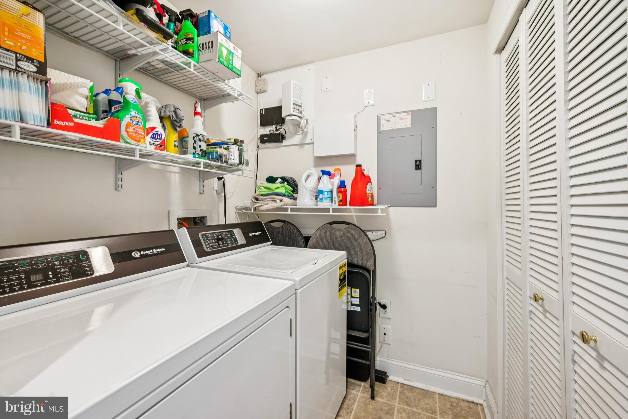 100 Aura Road, Unit 410 Clayton, NJ 08312 - Photo 22 of 25 Efficient laundry space with ample storage.