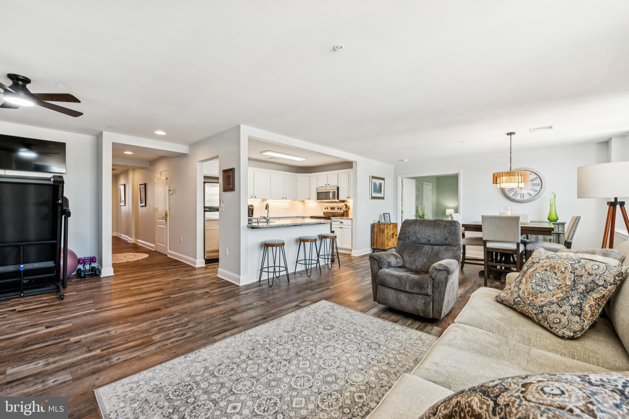 100 Aura Road, Unit 410 Clayton, NJ 08312 - Photo 3 of 25 Spacious open-concept living area awaits.