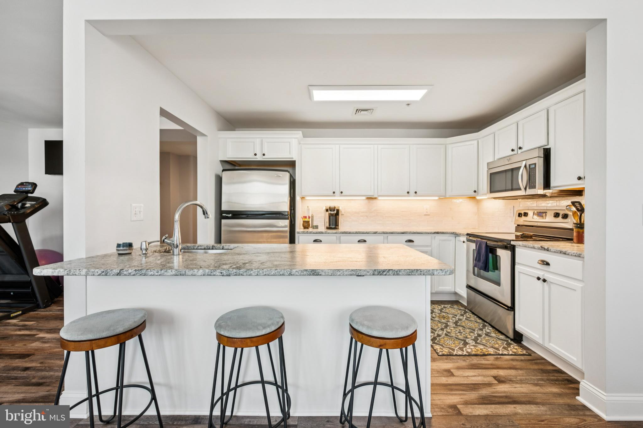 100 Aura Road, Unit 410 Clayton, NJ 08312 - Photo 6 of 25 Modern kitchen with sleek finishes.