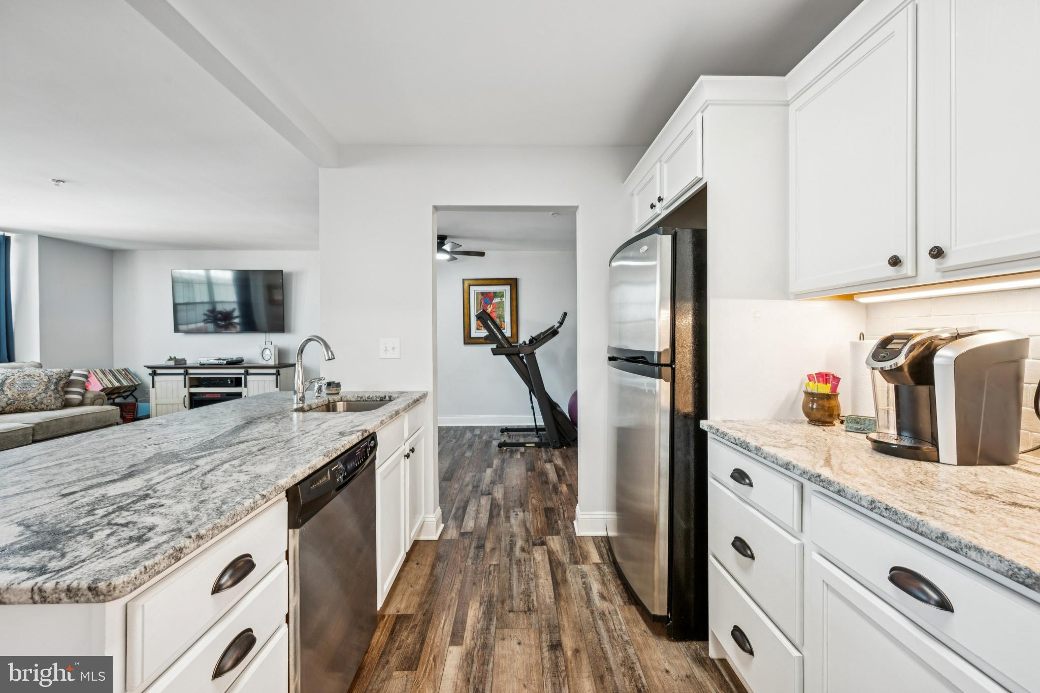100 Aura Road, Unit 410 Clayton, NJ 08312 - Photo 7 of 25 Modern kitchen with sleek finishes.