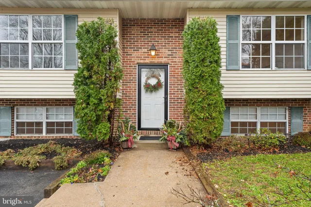 a front view of a house having yard