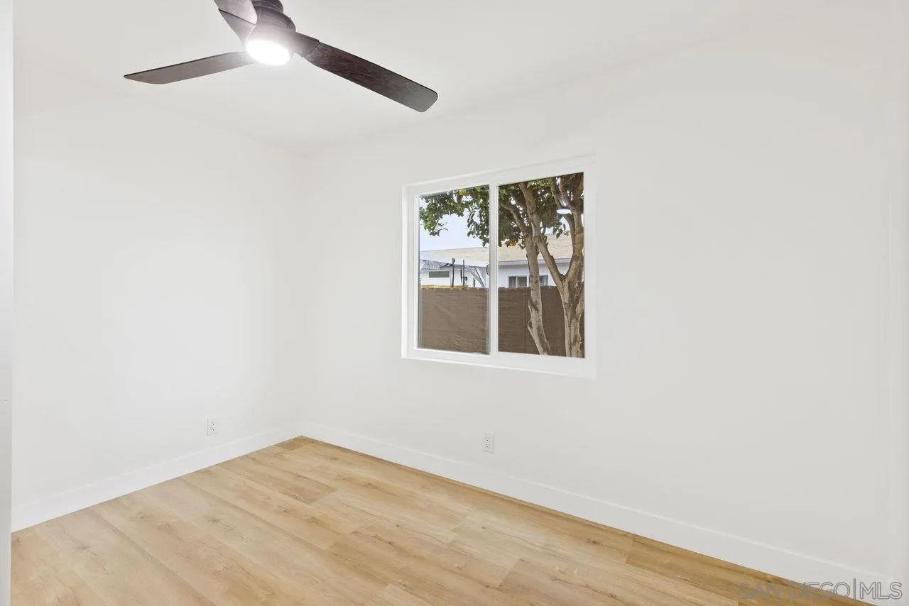 1320 Higgins Street Oceanside, CA 92058 - Photo 21 of 25 an empty room with a window