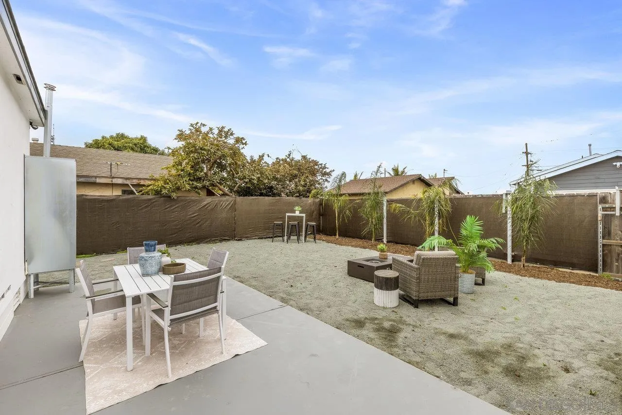1320 Higgins Street Oceanside, CA 92058 - Photo 24 of 25 a backyard of a house with table and chairs