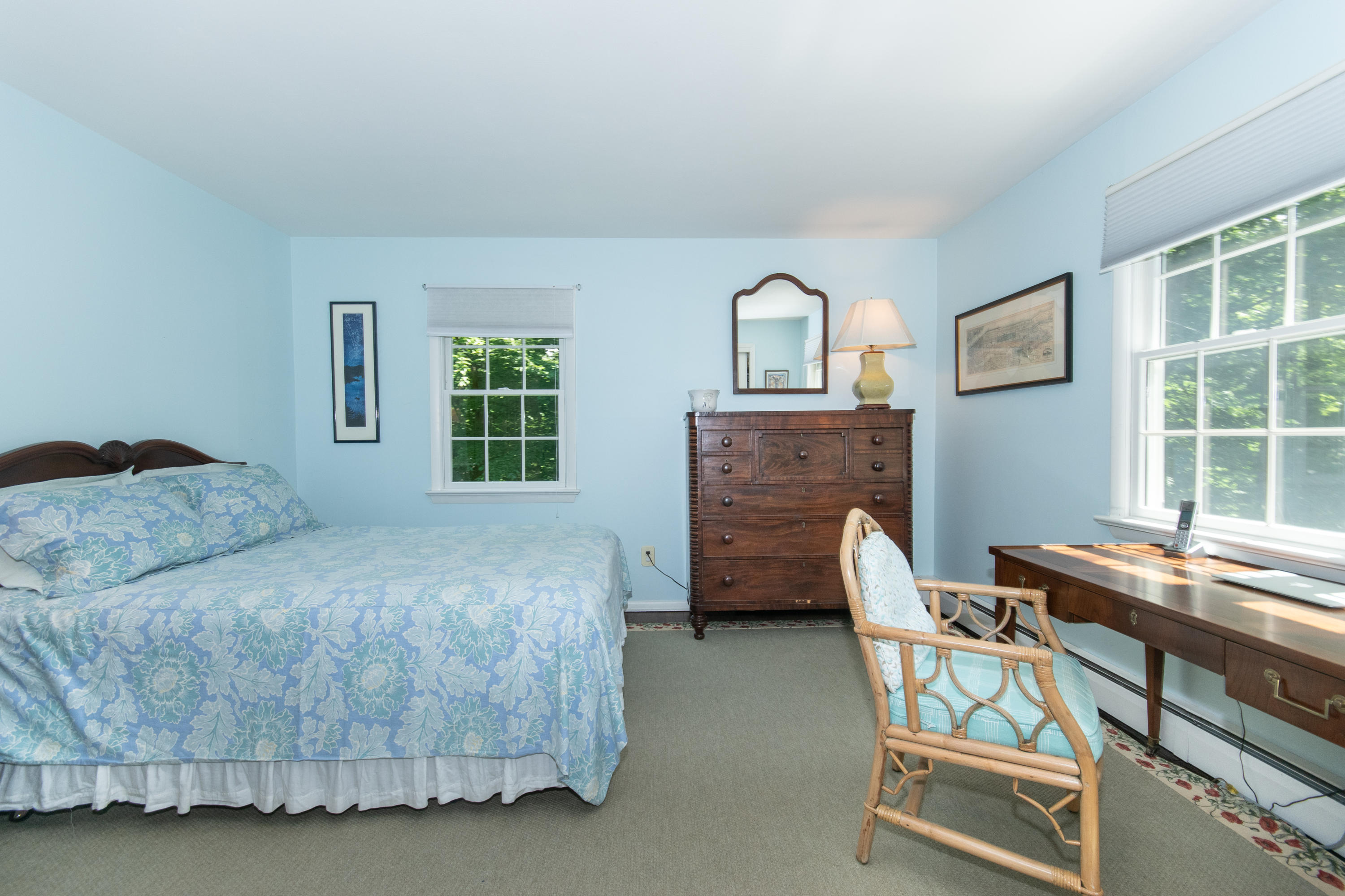 71 Rocky Brook Road New Canaan, CT 06840 - Photo 17 of 28 a bedroom with a bed and a desk