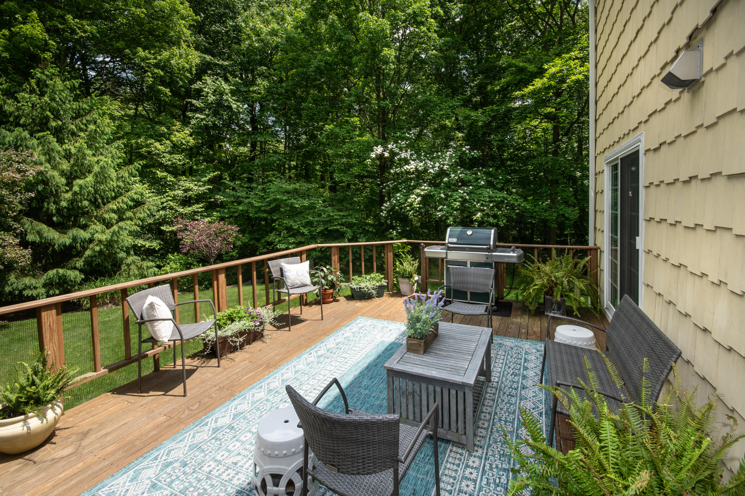 71 Rocky Brook Road New Canaan, CT 06840 - Photo 23 of 28 a view of balcony with furniture and trees