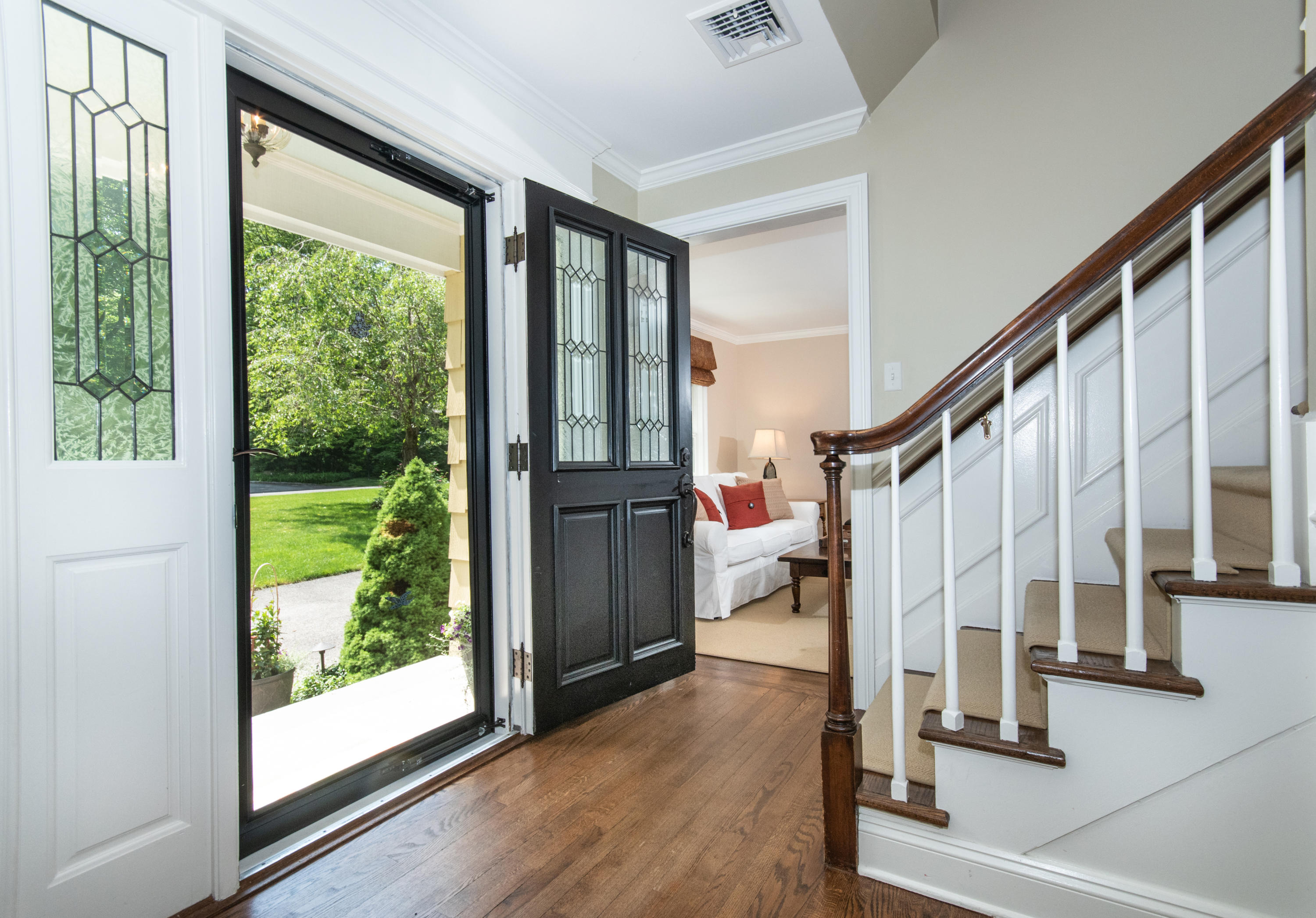 71 Rocky Brook Road New Canaan, CT 06840 - Photo 5 of 28 a view of an entryway with wooden floor and door