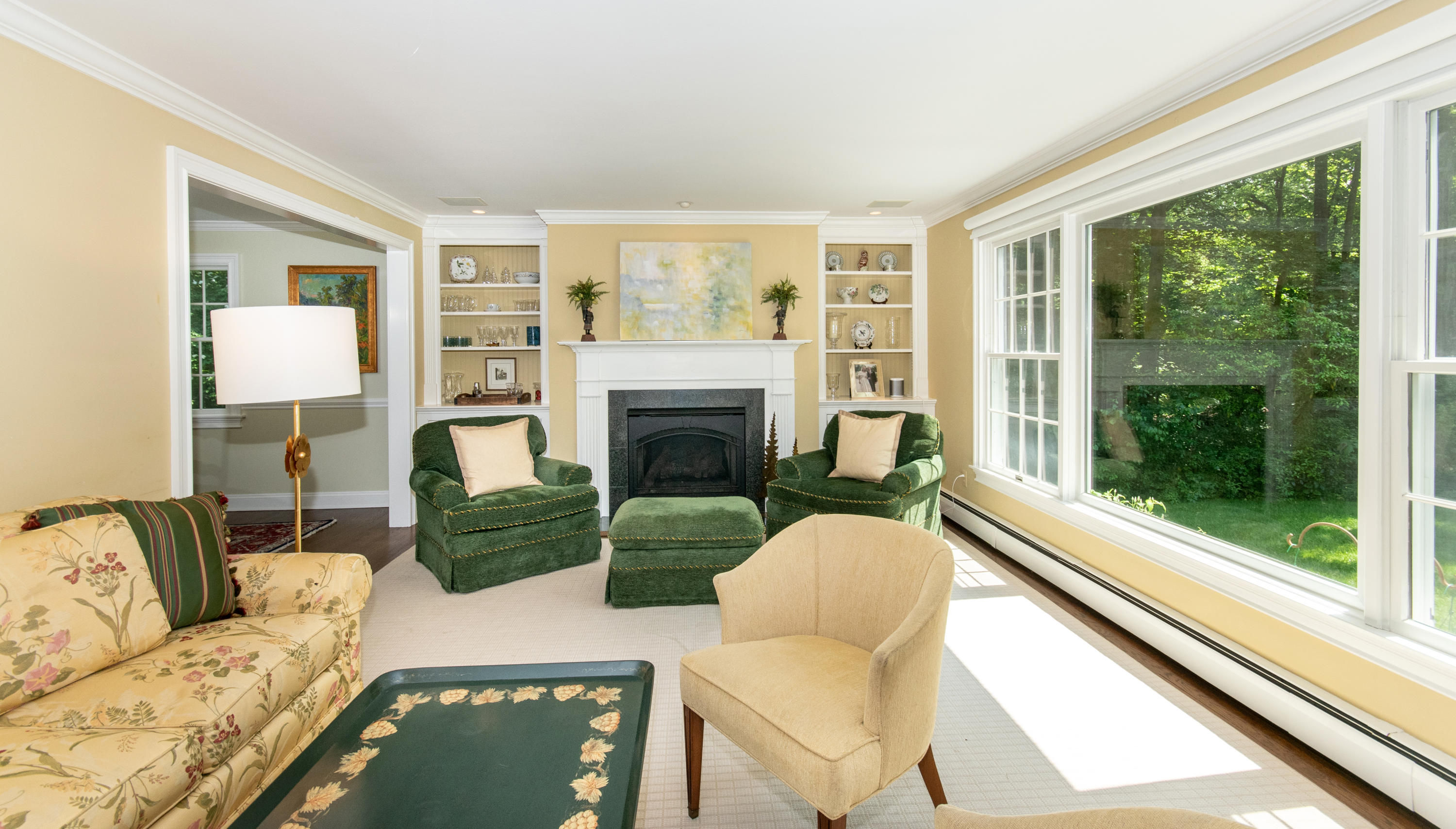71 Rocky Brook Road New Canaan, CT 06840 - Photo 6 of 28 a living room with furniture and a fireplace
