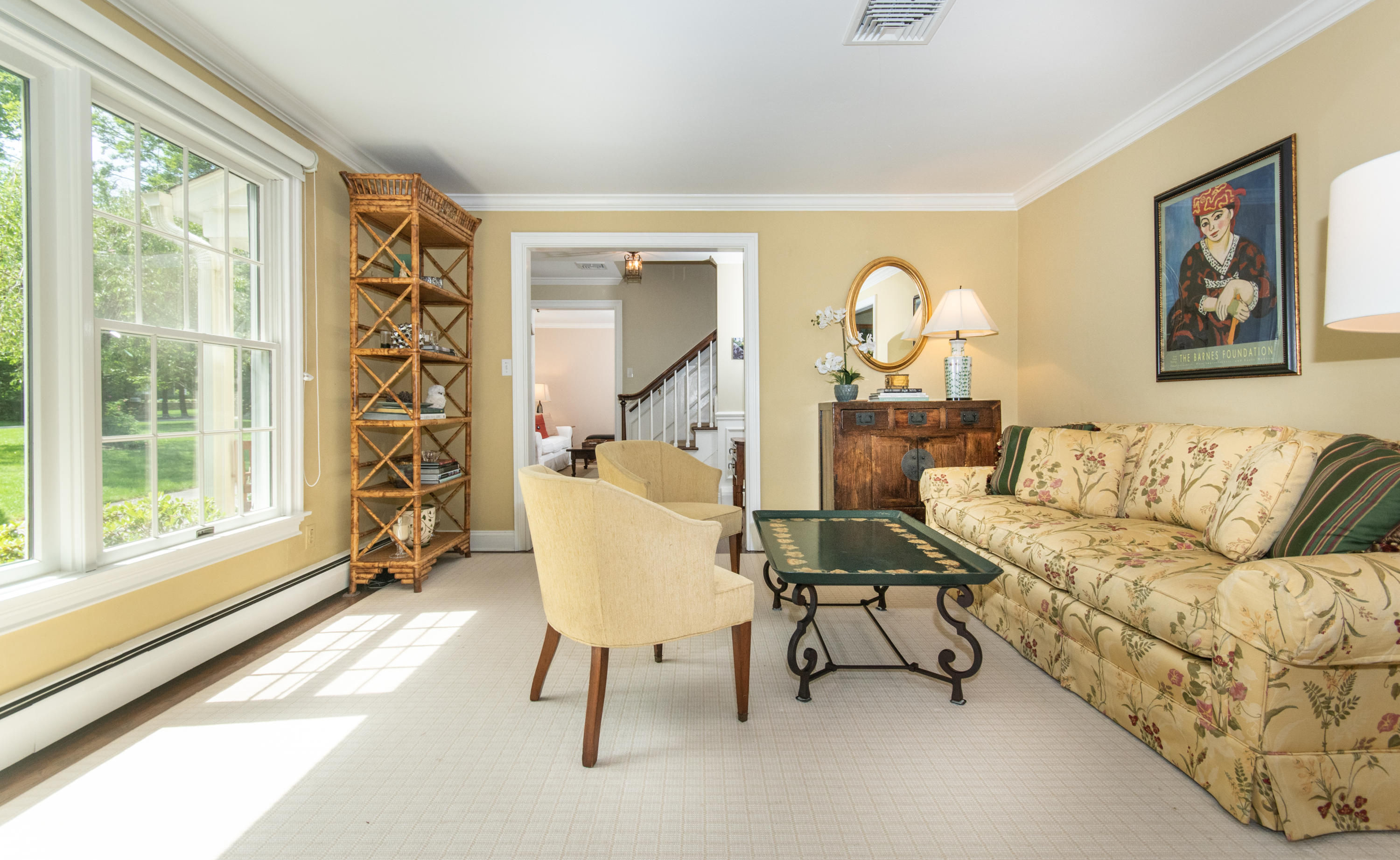 71 Rocky Brook Road New Canaan, CT 06840 - Photo 8 of 28 a living room with furniture and a large window