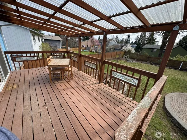 a view of a chairs on the roof deck