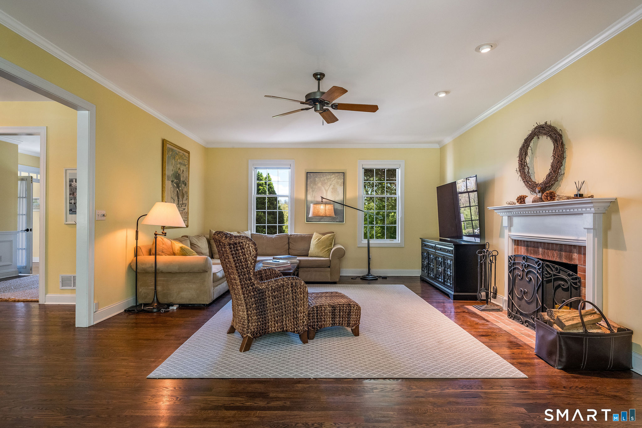 170 Devonshire Lane Madison, CT 06443 - Photo 12 of 39 a living room with furniture and a fireplace