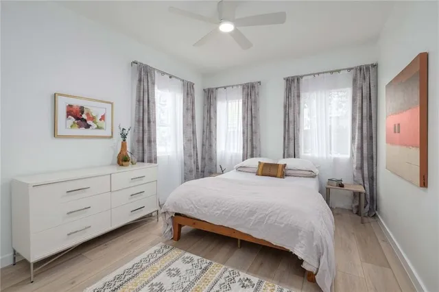 a bedroom with a bed and a dresser