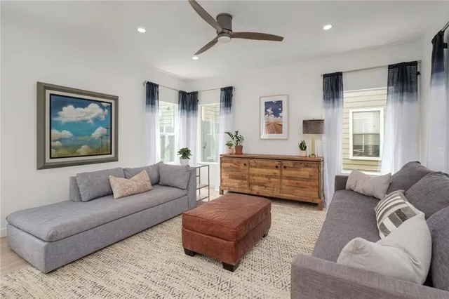 a living room with furniture and a window
