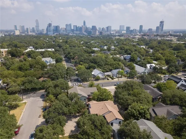 an aerial view of a city with lots of residential buildings