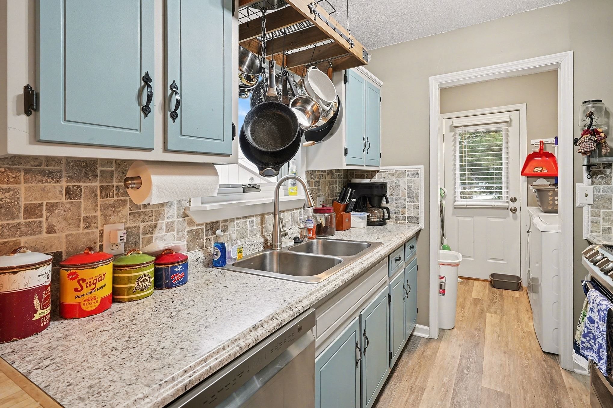 4918 Woodrow Road Woodlawn, TN 37191 - Photo 12 of 28 a kitchen with a stove a sink and a stove