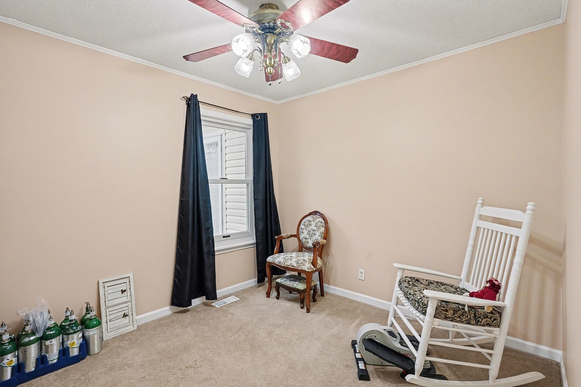 4918 Woodrow Road Woodlawn, TN 37191 - Photo 19 of 28 a view of a workspace with furniture and a window