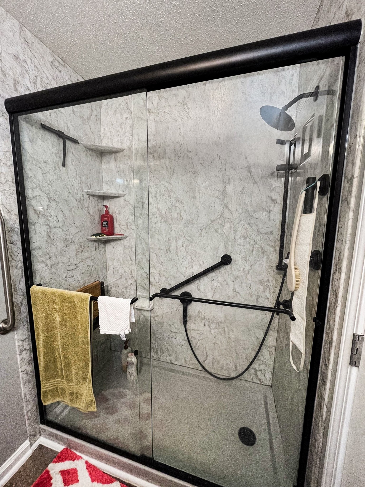 4918 Woodrow Road Woodlawn, TN 37191 - Photo 22 of 28 a bathroom with a shower and mirror