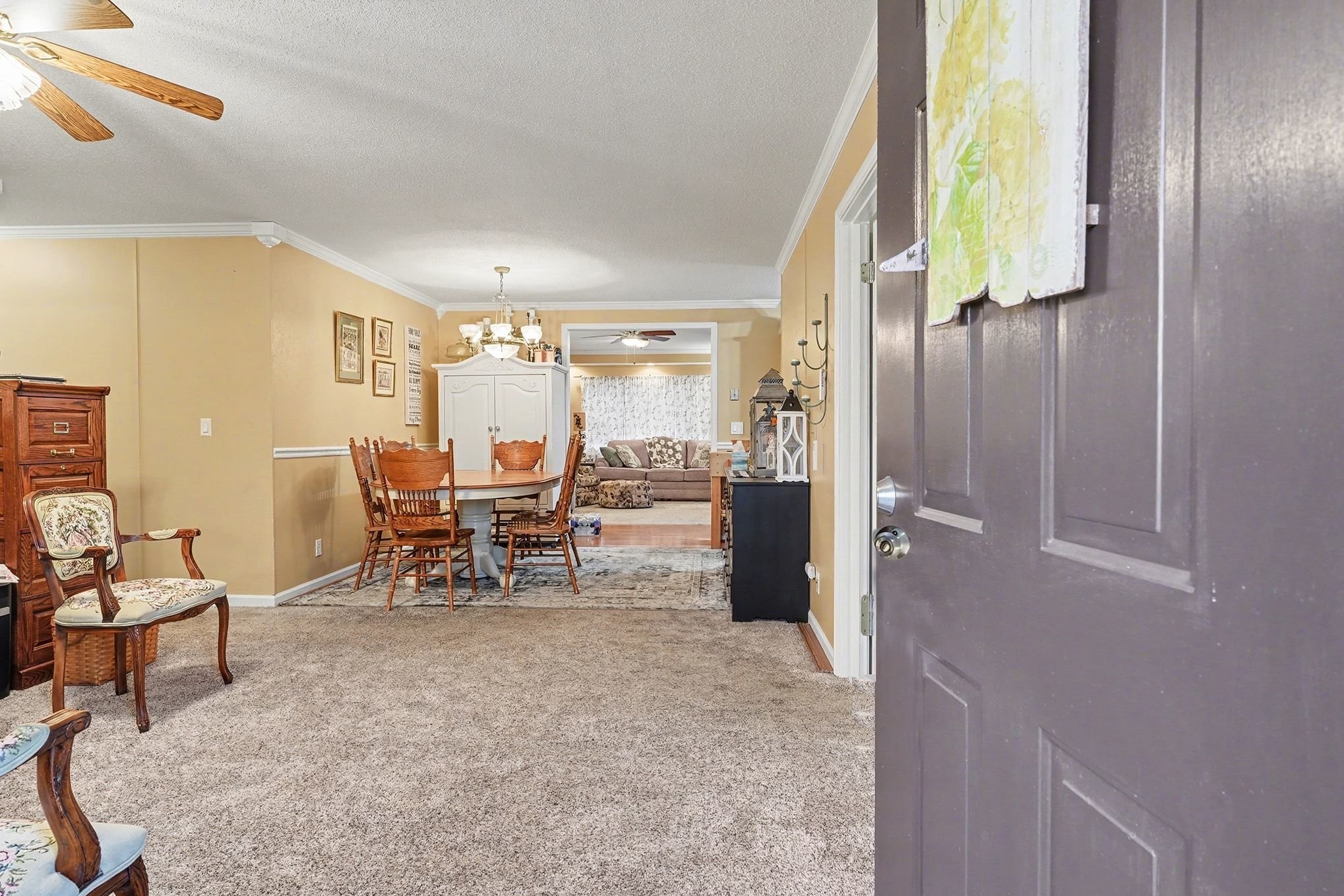 4918 Woodrow Road Woodlawn, TN 37191 - Photo 3 of 28 a view of a dining room with furniture and a window