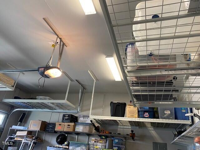 5343 Topspin Court Raleigh, NC 27609 - Photo 35 of 36 Extensive ceiling hung Storage above cars