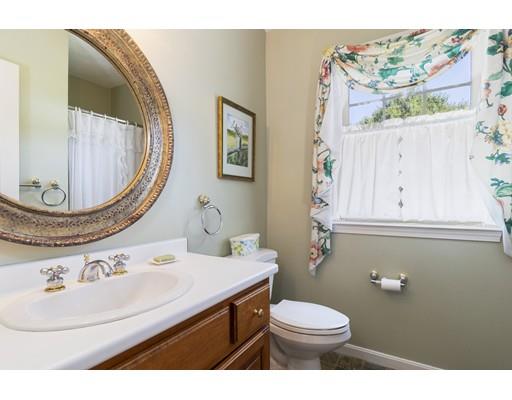35 Culloden Drive Canton, MA 02021 - Photo 15 of 31 a bathroom with a sink a toilet and a mirror