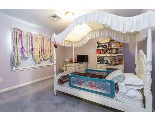 35 Culloden Drive Canton, MA 02021 - Photo 19 of 31 a living room with furniture and a chandelier