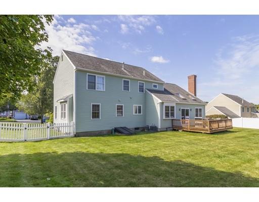35 Culloden Drive Canton, MA 02021 - Photo 26 of 31 a big house with a big yard and more large trees