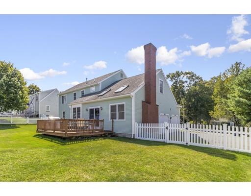 35 Culloden Drive Canton, MA 02021 - Photo 28 of 31 a front view of a house with a garden and plants