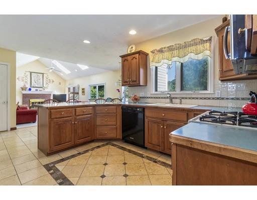35 Culloden Drive Canton, MA 02021 - Photo 5 of 31 a kitchen with a sink a stove and cabinets
