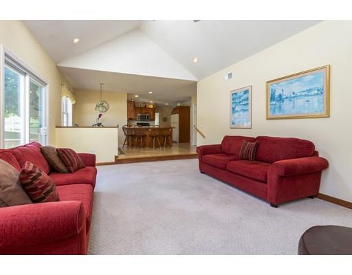 35 Culloden Drive Canton, MA 02021 - Photo 8 of 31 a living room with furniture and a flat screen tv