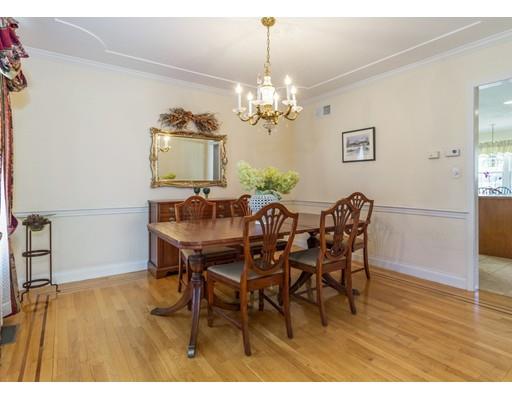 35 Culloden Drive Canton, MA 02021 - Photo 10 of 31 a view of a dining room with furniture and chandelier