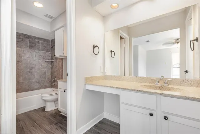 a view of bathroom with a sink and a toilet