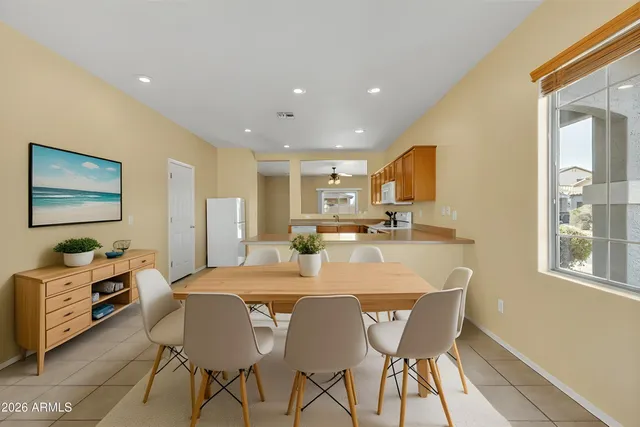 a view of kitchen with furniture and large window