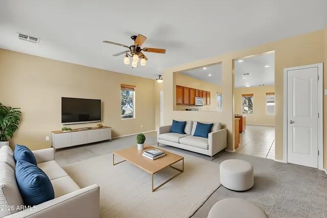 a view of a swimming pool with an outdoor space and seating area