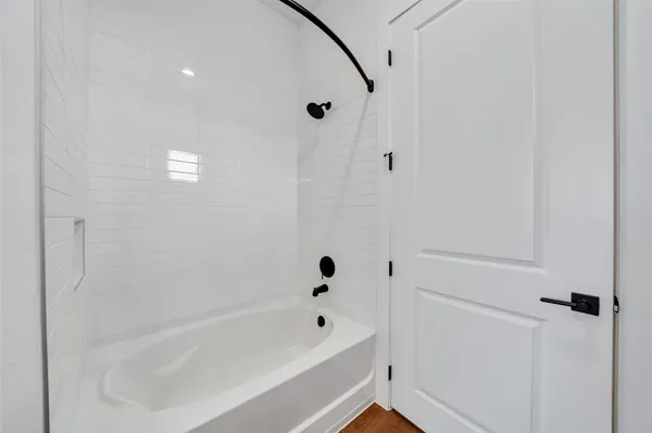 a bathroom with a bathtub