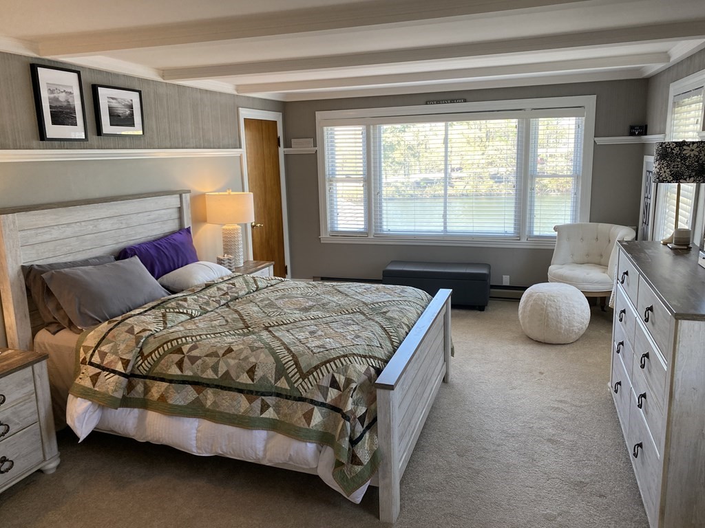100 Union Point Road Webster, MA 01570 - Photo 21 of 31 a bed room with a bed and a window