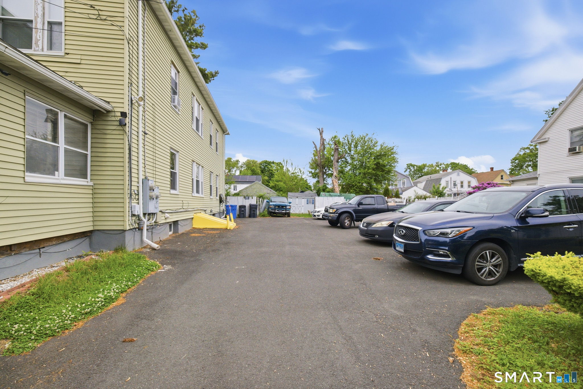 76 Harold Street Hartford, CT 06112 - Photo 12 of 12 a view of a cars parked in front of a house
