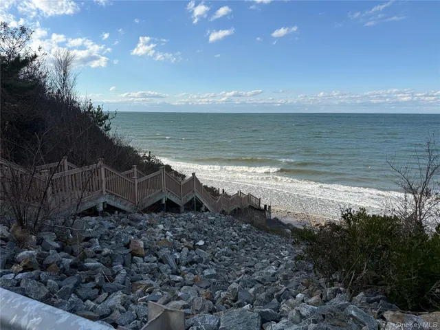 a view of a lake next to a large building
