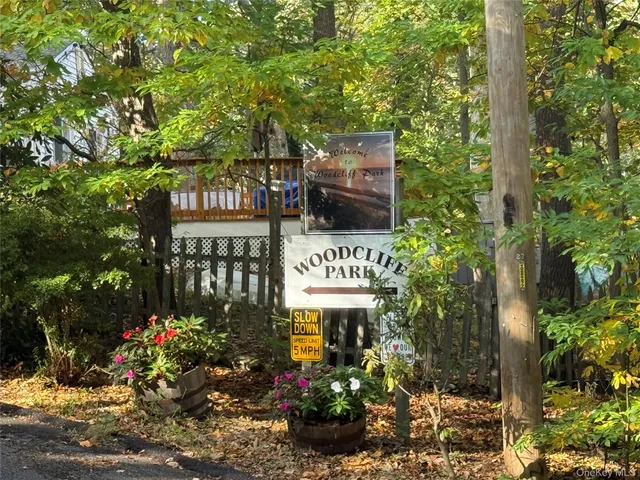 a view of a house with a flower garden