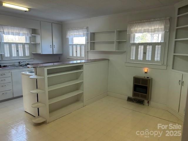 871 Bethany Church Road Forest City, NC 28043 - Photo 11 of 27 a kitchen with a cabinets and window