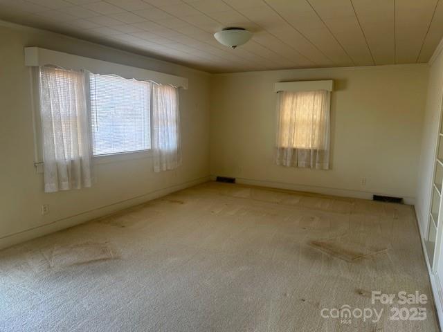 871 Bethany Church Road Forest City, NC 28043 - Photo 13 of 27 an empty room with a empty space and windows