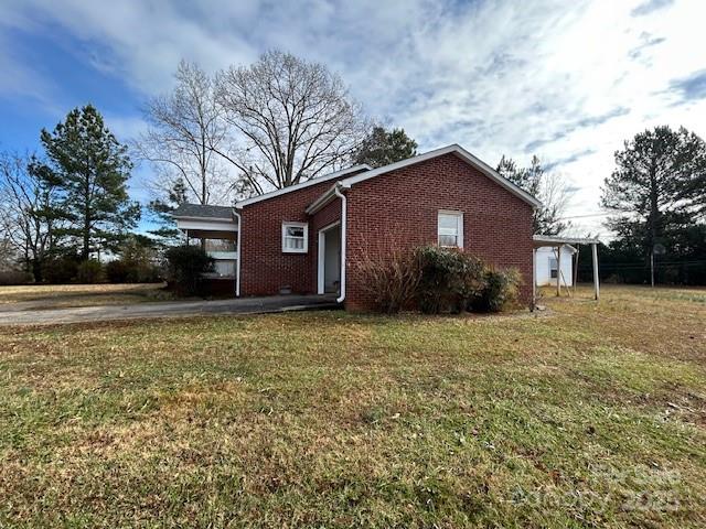 871 Bethany Church Road Forest City, NC 28043 - Photo 2 of 27 a front view of a house with garden