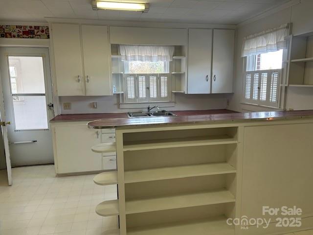 871 Bethany Church Road Forest City, NC 28043 - Photo 7 of 27 a kitchen with a sink cabinets and window