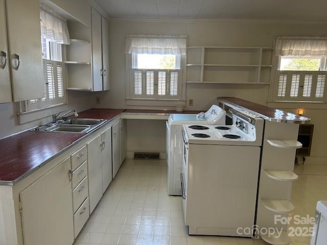 871 Bethany Church Road Forest City, NC 28043 - Photo 8 of 27 a kitchen with stainless steel appliances granite countertop a sink stove and cabinets