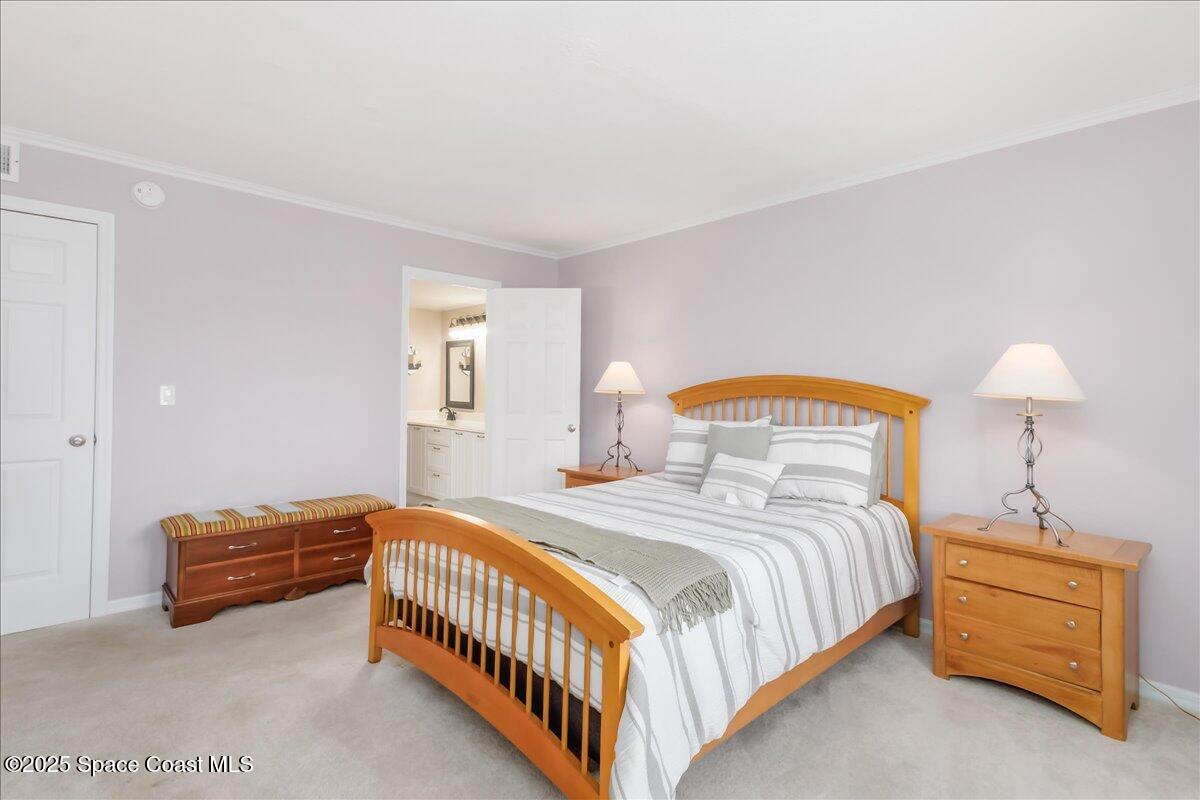 6124 River Run Drive Sebastian, FL 32958 - Photo 16 of 42 a bedroom with bed and a window