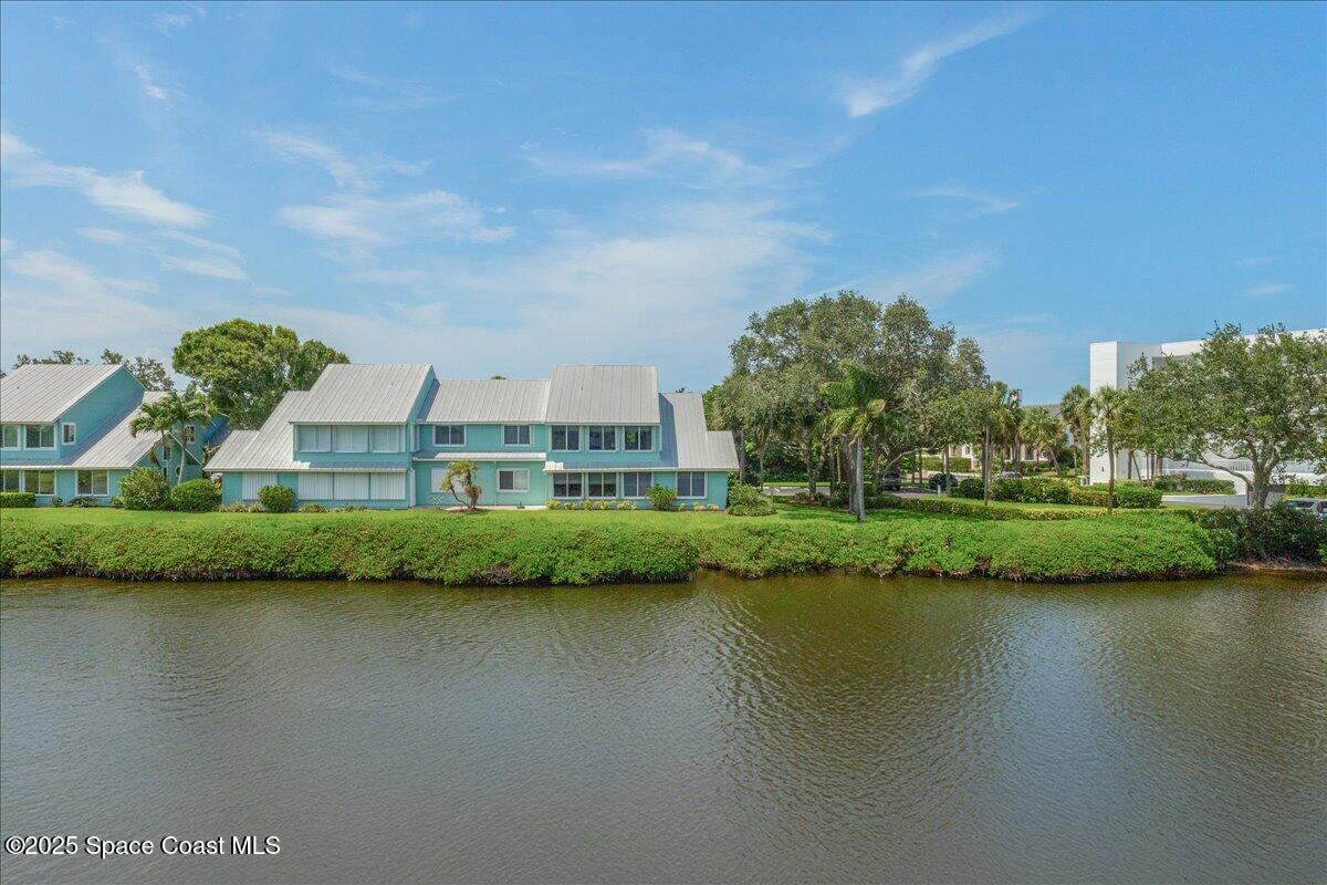 6124 River Run Drive Sebastian, FL 32958 - Photo 26 of 42 a view of building with river in front of it