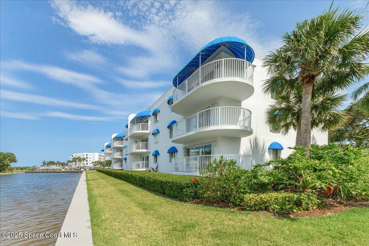 6124 River Run Drive Sebastian, FL 32958 - Photo 28 of 42 a front view of a house with a yard