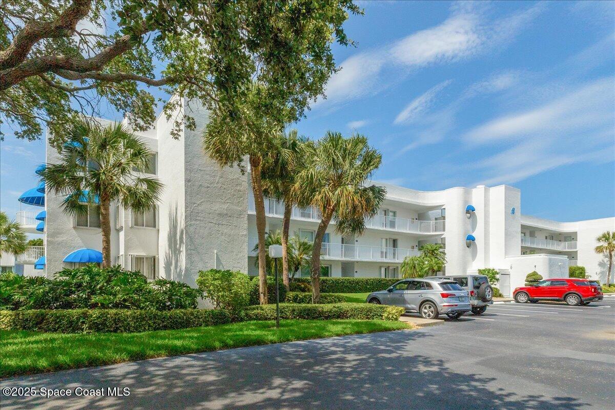 6124 River Run Drive Sebastian, FL 32958 - Photo 30 of 42 a view of a cars parked in front of a building