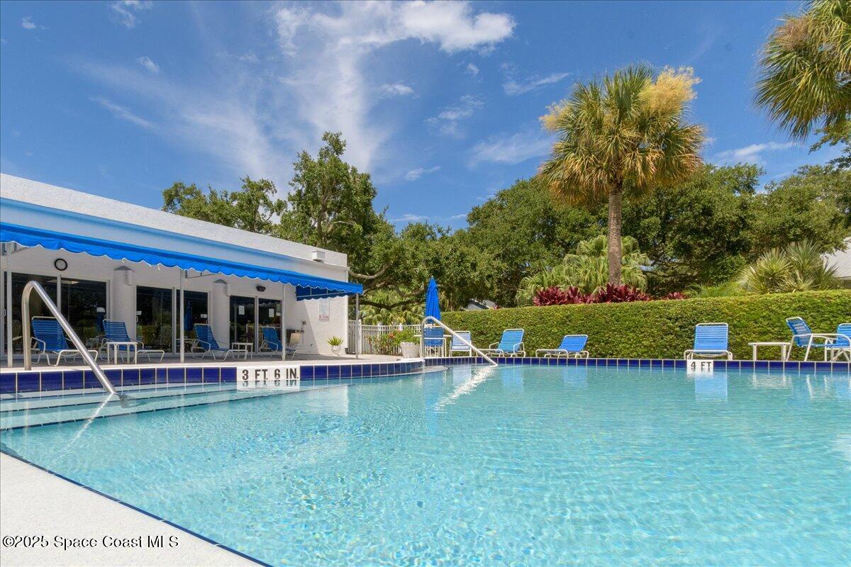 6124 River Run Drive Sebastian, FL 32958 - Photo 35 of 42 swimming view of a house with a yard balcony and sitting area