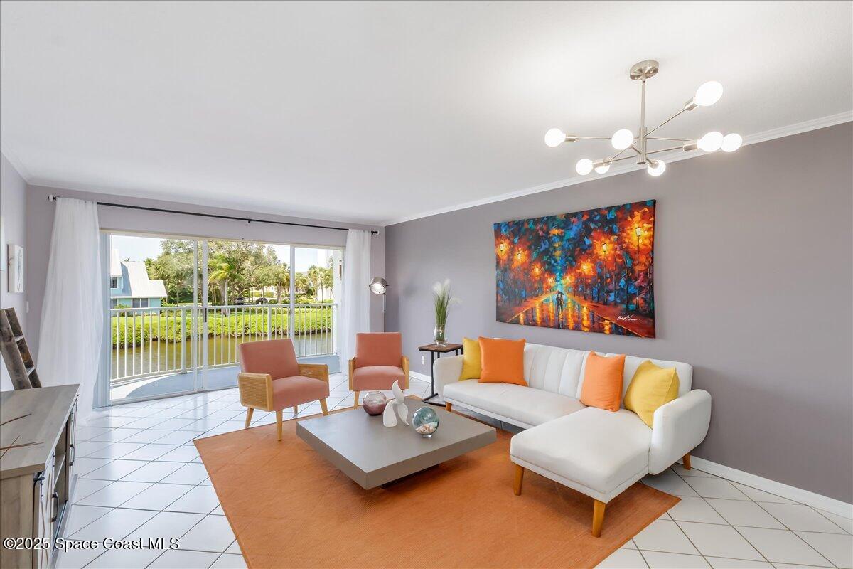 6124 River Run Drive Sebastian, FL 32958 - Photo 4 of 42 a living room with furniture a rug and a large window